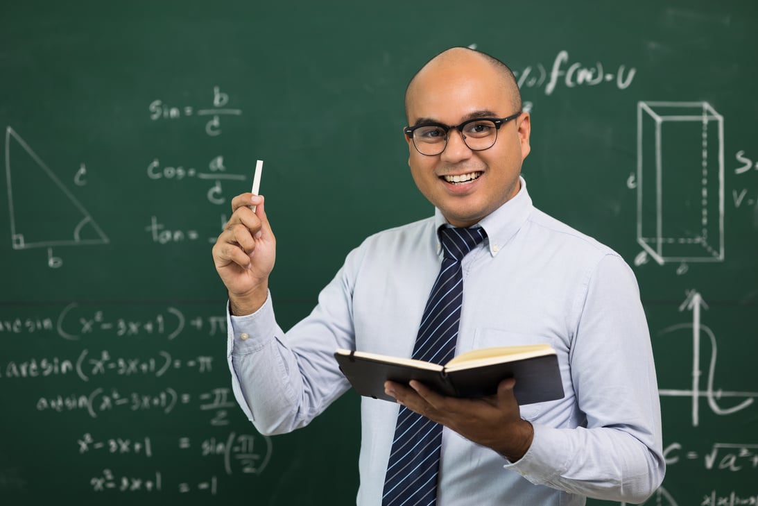 Young asian teacher man teaching video conference with student. Male Indian teacher training the mathematics in classroom from online course.